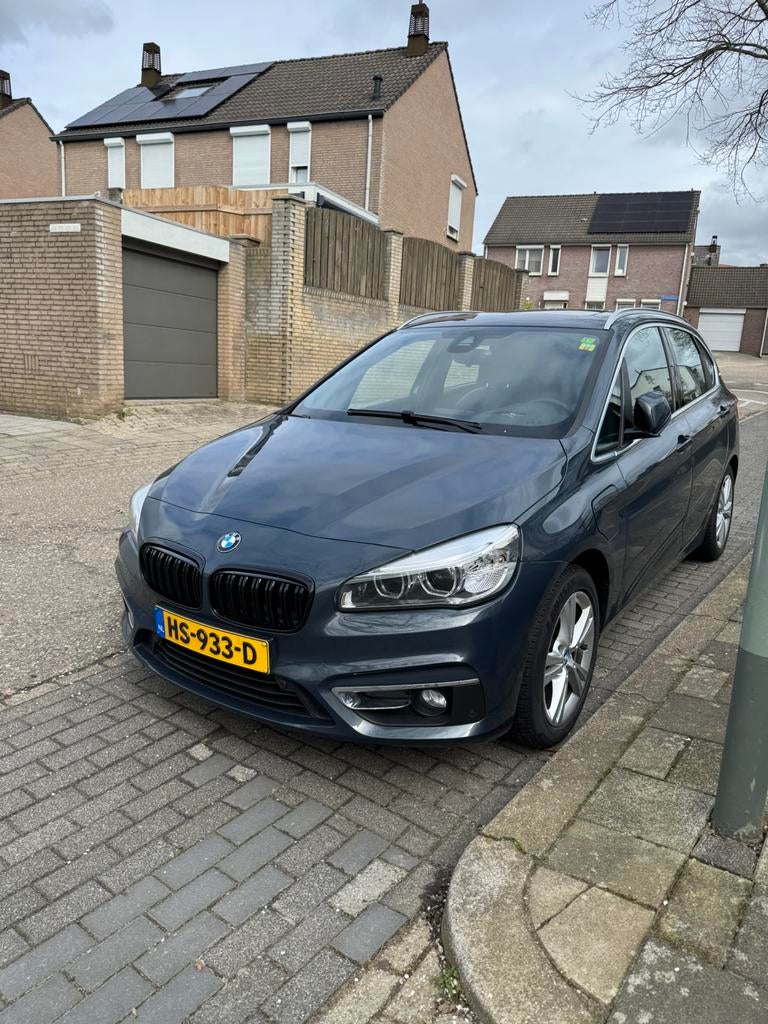 BMW 2-Serie Active Tourer 225xe 224pk Aut 2015 Grijs, Auto's, Automaat, 136 pk, Vierwielaandrijving, 3 cilinders