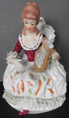 Beeld Zittende vrouw met handharp., Ophalen of Verzenden