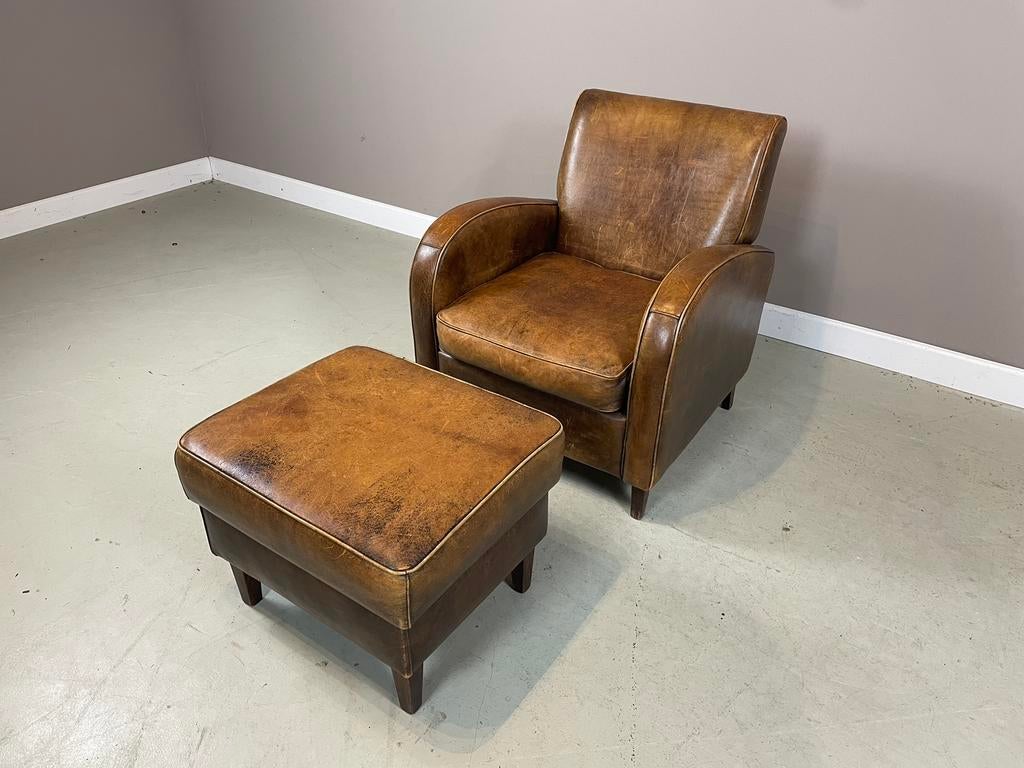 Schapenleren “Wagenwiel” fauteuil van King’s Design I.Z.G.S., Ophalen, Zo goed als nieuw, Leer