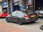 BMW 4-serie Coupé 420i High Executive Aut Leer Navi Clima, Auto's, Achterwielaandrijving, Gebruikt, Euro 6, 4 stoelen