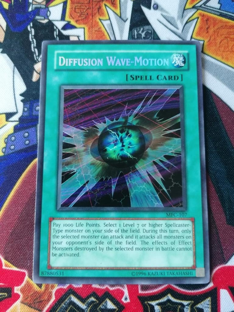 Diffusion Wave Motion - Secret Rare MFC - Yu-Gi-Oh, Ophalen of Verzenden, Zo goed als nieuw, Foil