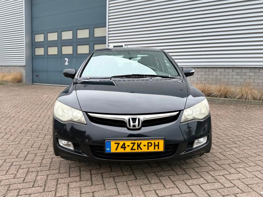 Honda Civic 1.3 Hybrid (bj 2008) AUTOMAAT/LEER/CLIMA/STOELVE, Auto's, Gebruikt, Stoelverwarming, Zwart, Bedrijf