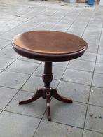 Hoog salontafeltje, Ophalen