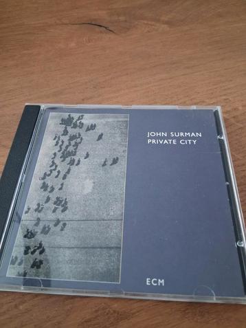 JOHN SURMAN - Private City  CD beschikbaar voor biedingen