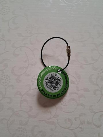 Sleutelhanger met QR Code beschikbaar voor biedingen