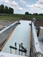 Zeven, bandzeven en trommelzeven, Ophalen