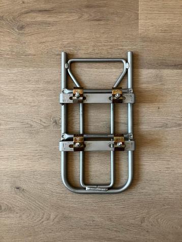 Adapter voor kinderfietsstoel beschikbaar voor biedingen