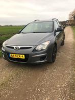 Hyundai i30 1.4i Cvvt 109pk Blue 2010 Grijs, Auto's, Voorwielaandrijving, Stof, Zwart, 4 cilinders