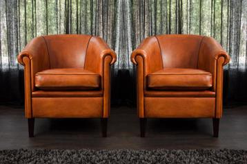 Clubbfauteuils in superdik schapenleer beschikbaar voor biedingen