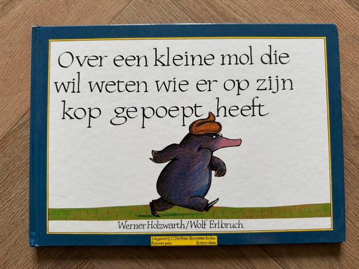 Over een kleine mol die wil weten wie er op zijn kop gepoept, Boeken, Prentenboeken en Plaatjesalbums, Zo goed als nieuw, Ophalen of Verzenden