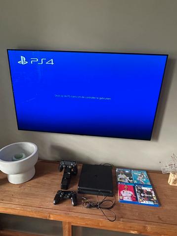PlayStation 4 Slim + 2 controllers + games beschikbaar voor biedingen