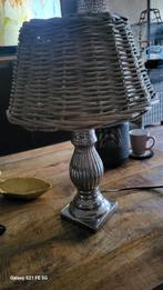 Lamp met rieten kap, Ophalen