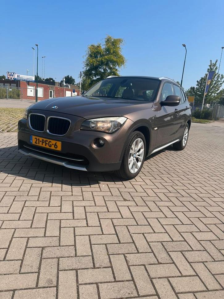 BMW X1 2.0 D Sdrive 18D AUT 2011 Bruin, Auto's, BMW, Particulier, X1, Diesel, Euro 5, D, SUV of Terreinwagen, Automaat, Origineel Nederlands