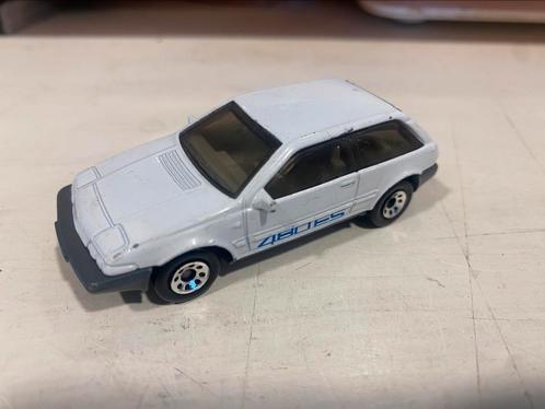 1:64 Volvo 480 ES Matchbox wit, Hobby en Vrije tijd, Modelauto's | Overige schalen, Gebruikt, Auto, Ophalen of Verzenden