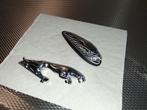 roofvogel en jaguar embleem, Ophalen