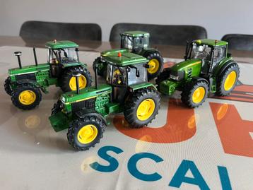 Vier John Deere tractors Wiking Schuco Ertl beschikbaar voor biedingen