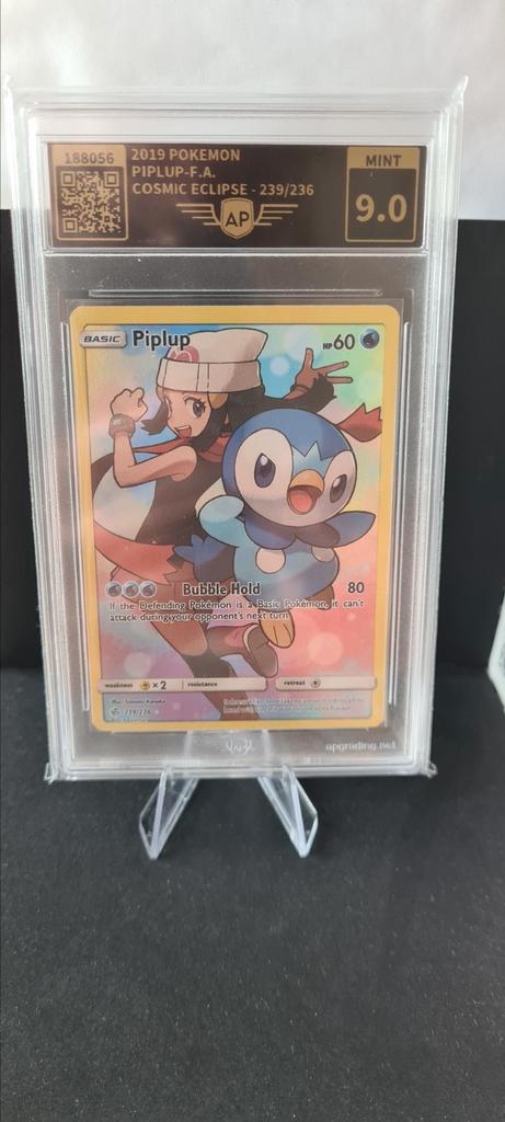 Piplup 239 Cosmic Eclipse GRADED 9.0 AP GRADING, Hobby en Vrije tijd, Verzamelkaartspellen | Pokémon, Zo goed als nieuw, Ophalen of Verzenden