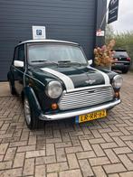 Classic mini Cooper 1275 bouwjaar 1995, Auto's, Voorwielaandrijving, Stof, 4 cilinders, Bedrijf