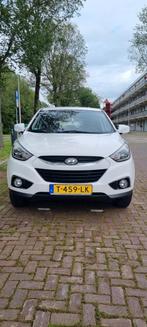 Hyundai Tucson iX35 1.6 GDI 2WD 2014 Wit, Auto's, Hyundai, Voorwielaandrijving, 65 €/maand, 15 km/l, 1280 kg