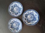 Drie porseleinen schoteltjes met blauw decor, Ophalen