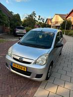 Daihatsu Cuore 1.0 5D 2009 Grijs, Auto's, Daihatsu, Voorwielaandrijving, Stof, 600 kg, 4 stoelen