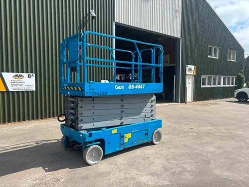 Genie GS 4047 schaarhoogwerker 13,7 mtr (bj 2015), Zakelijke goederen, Machines en Bouw | Liften, Steigers en Ladders