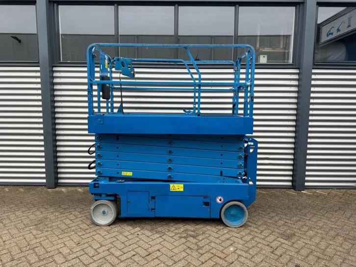 Genie GS4047 Hoogwerker Schaarhoogwerker (bj 2015), Zakelijke goederen, Machines en Bouw | Liften, Steigers en Ladders