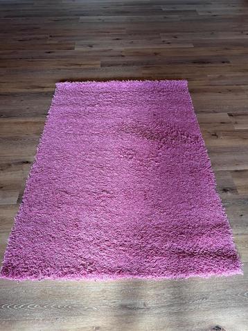 Roze vloerkleed beschikbaar voor biedingen