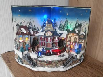 Kerstboek met Verlichting en Rijdende Trein beschikbaar voor biedingen