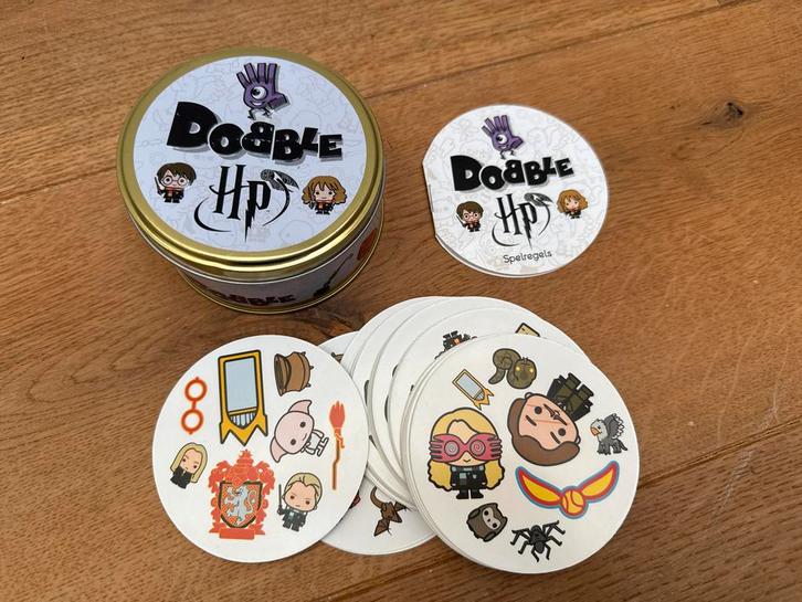 Dobble Harry Potter editie, Hobby en Vrije tijd, Gezelschapsspellen | Bordspellen, Gebruikt, Een of twee spelers, Reisspel, Ophalen of Verzenden