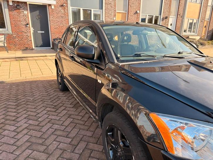 Dodge Caliber 1.8 2007 Zwart, Auto's, Dodge, Particulier, Caliber, Benzine, C, Hatchback, Handgeschakeld, Origineel Nederlands
