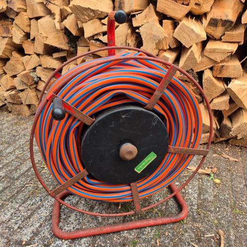 Vintage Jungmann tuinslang op haspel, Tuin en Terras, Tuinslangen, Gebruikt, Tuinslang, Ophalen of Verzenden