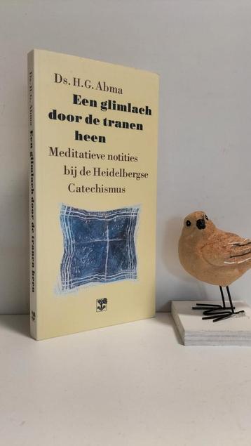 Abma, Ds. H.G.; Een glimlach door de tranen heen beschikbaar voor biedingen