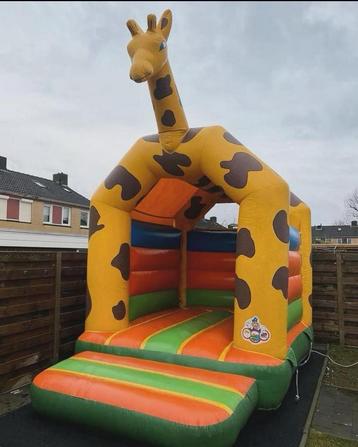 TE HUUR. Springkussen girraf beschikbaar voor biedingen
