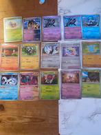 Veel pokemon prismatic evolution - surging sparks holo, Ophalen of Verzenden, Zo goed als nieuw, Losse kaart
