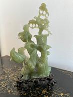 Jade beeld van twee vogels en planten op basement, Ophalen of Verzenden