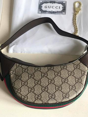 1 op 1 tasje Gucci beschikbaar voor biedingen