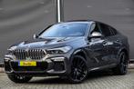 BMW X6 M50i 4.4 V8 530Pk | Dravitgrau | Iconic Glow, Auto's, BMW, Origineel Nederlands, Te koop, Zilver of Grijs, 2215 kg