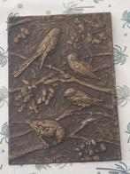Bronzen vogelplaquette, Ophalen, Brons