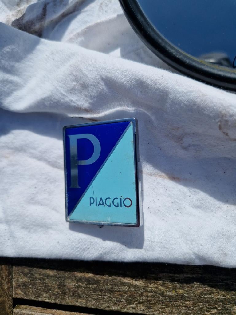 Piaggio logo voor Vespa LX50, Ophalen