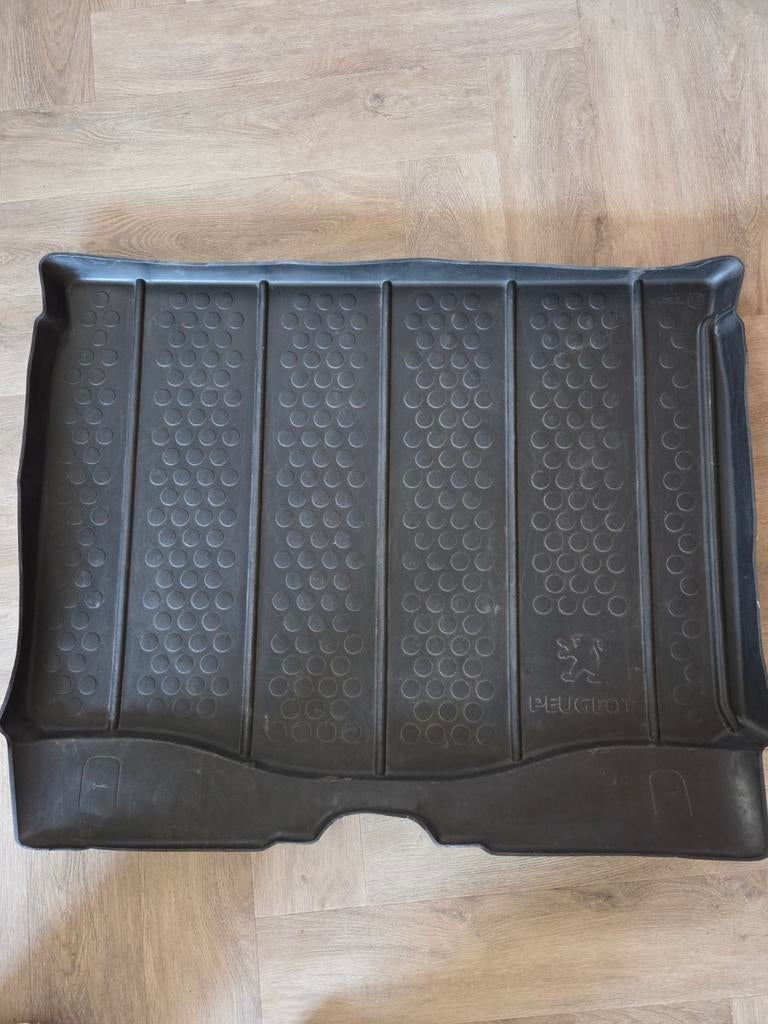 Kofferbakmat Peugeot, Ophalen