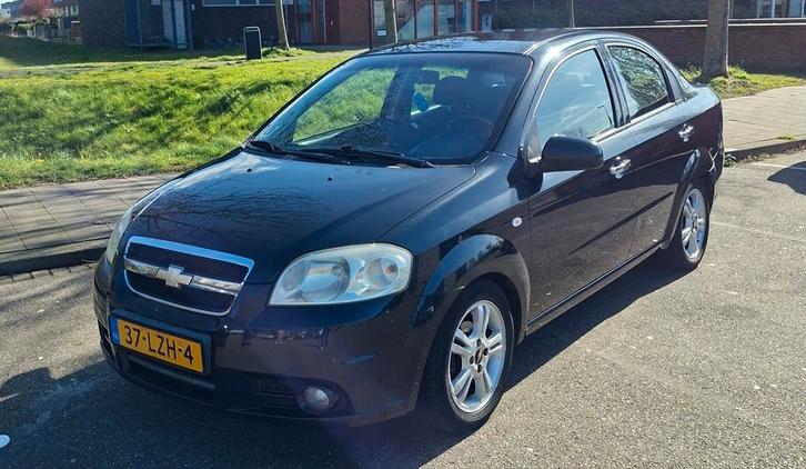 Chevrolet Aveo 1.4 16V 4D 2010 Zwart, Auto's, Chevrolet, Particulier, Aveo, Airbags, Airconditioning, Alarm, Bluetooth, Climate control