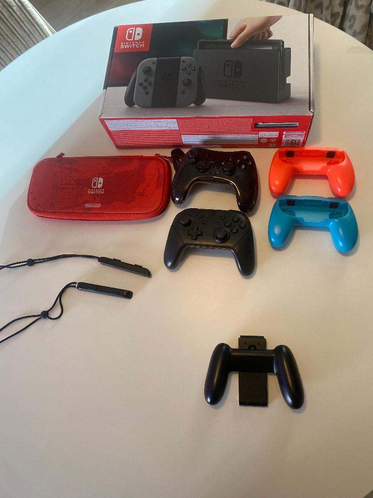 Nintendo switch met 4 consoles en veel spellen, Spelcomputers en Games, Spelcomputers | Nintendo Switch, Ophalen of Verzenden