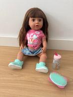Zusje Baby Born pop met bruin haar en accessoires, Ophalen, Gebruikt, Babypop