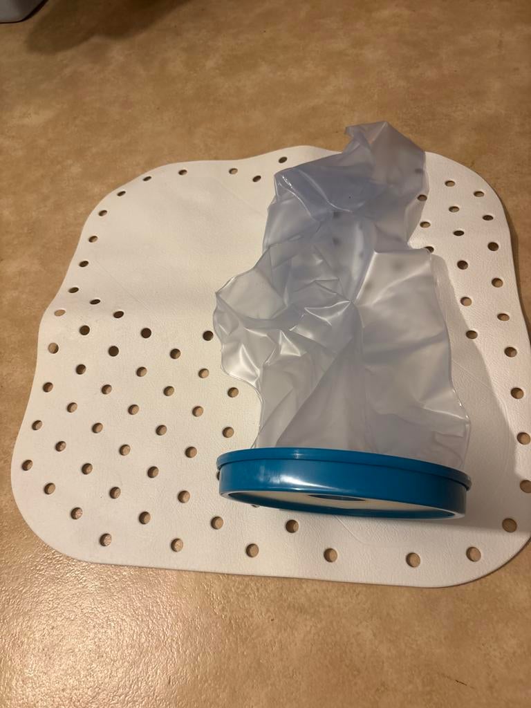 Douche mat en douchezak, Ophalen