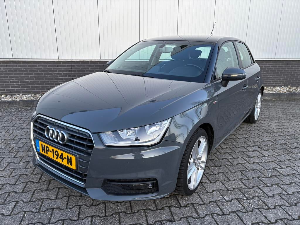 Audi A1 1.0 Tfsi 70KW Sportback S-tr 2015 Grijs, Auto's, Stof, A1, Zwart, Bedrijf
