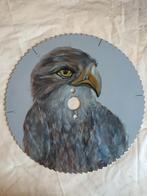 Roofvogel geschilderd op ijzeren zaagblad, Ophalen