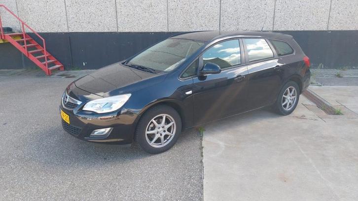 Opel Astra 1.4 74KW ST 2011 Zwart, Auto's, Opel, Particulier, Astra, Benzine, A, Stationwagon, Handgeschakeld, Geïmporteerd, Zwart