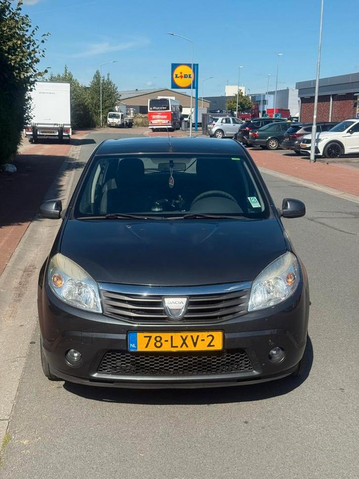 Dacia Sandero 1.2 16V 55KW 2010 Grijs, Auto's, Dacia, Particulier, Sandero, Airbags, Airconditioning, Bluetooth, Radio, Benzine