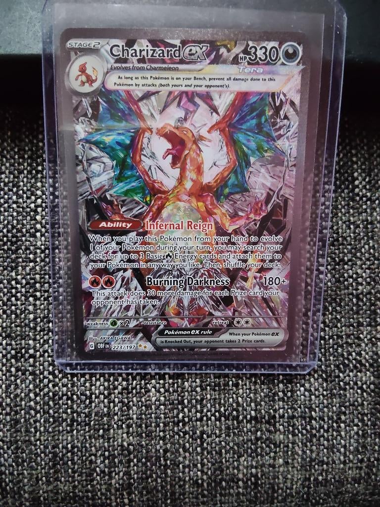 Charizard EX 223 obsidian Flames, Ophalen of Verzenden, Zo goed als nieuw, Losse kaart, Foil